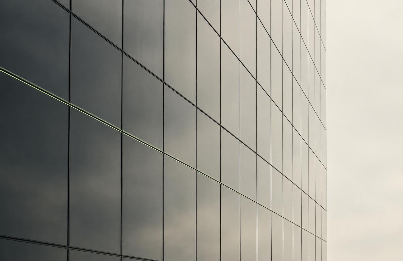 Glass and steel facade of a modern enterprise building